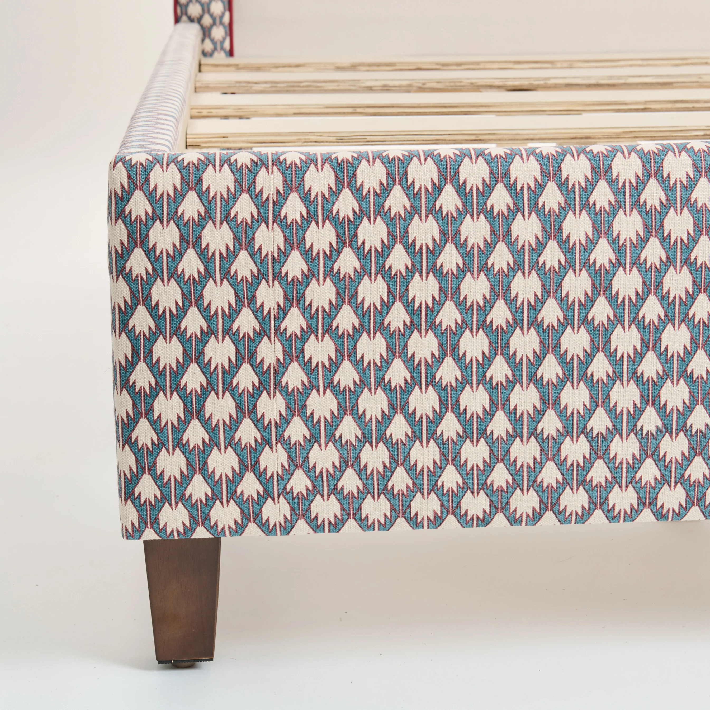 65”H Queen Platform Bed - Patterned Fabric - Red Trim - Image 9