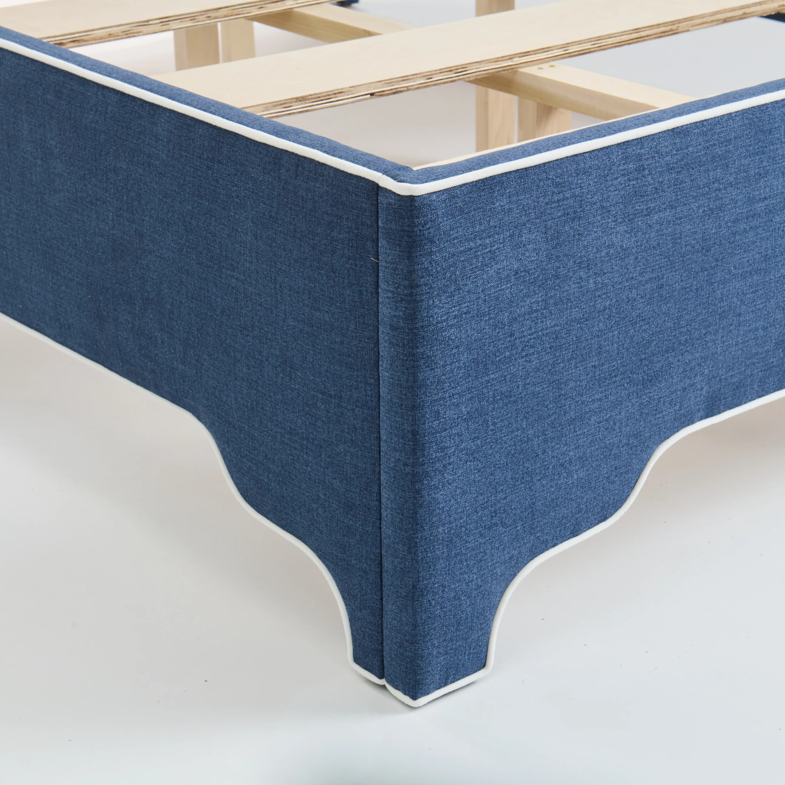 65"H King Upholstered Platform Bed - Scalloped Legs - Navy Woven Fabric with White Trim - Image 4